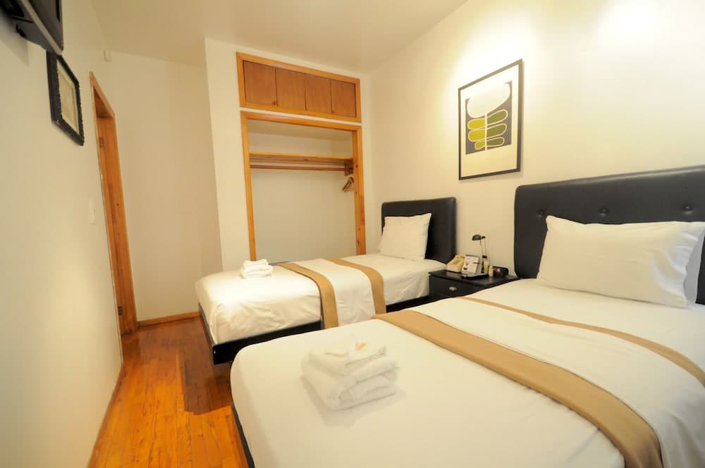 Off Soho Suites Hotel