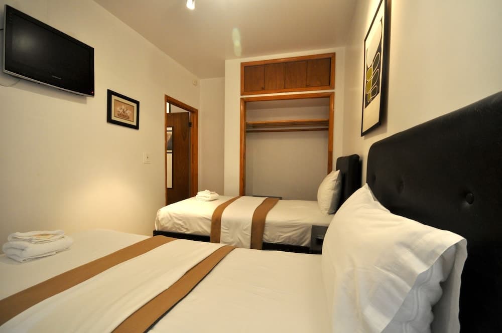 Off Soho Suites Hotel