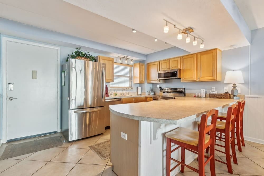 Direct Oceanfront Condo with Private Balcony by RedAwning