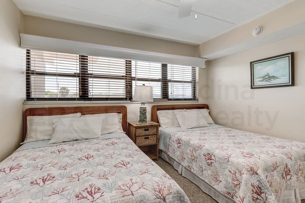 Upper unit Overlooking the Beautiful Outdoor Space and Pier by RedAwning