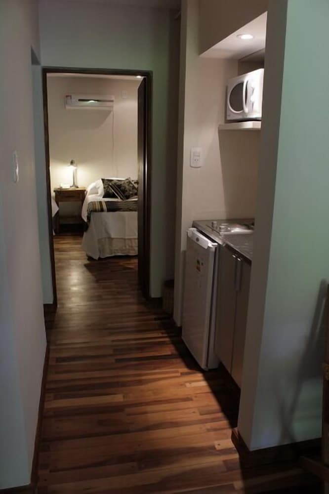 Rio Arriba Suites Apartments y Resto