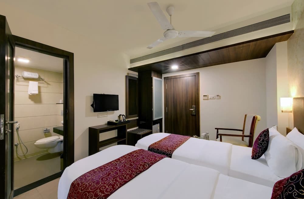 Central Beacon Hotel Surat