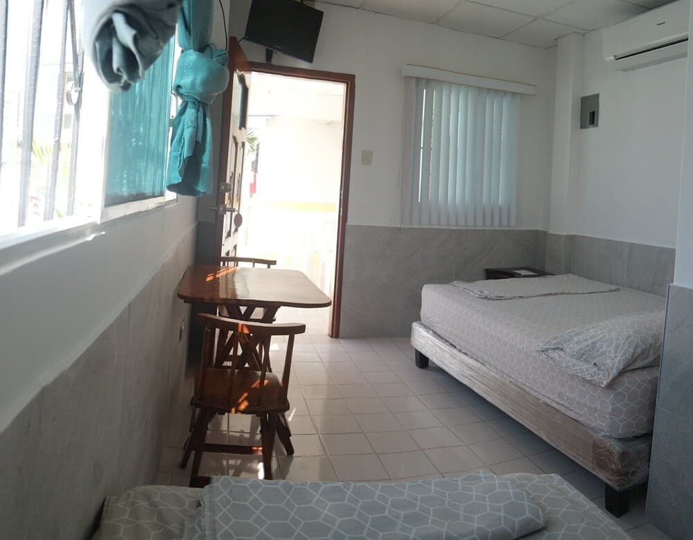 Hostal Palmeras Playa Milina