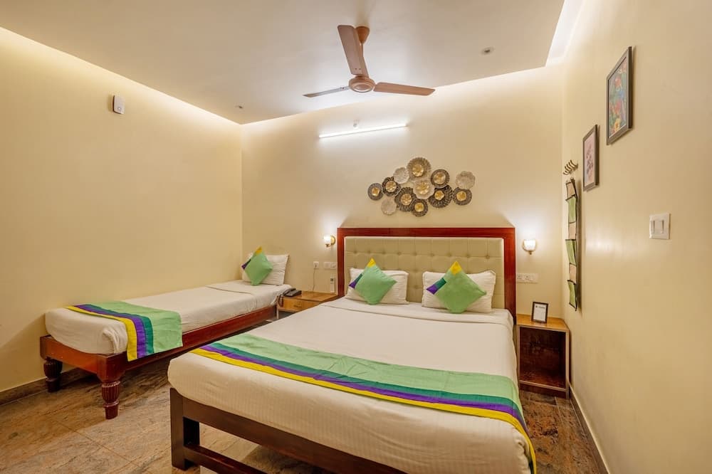 Treebo Grace Inn, 3 Min Walk From Promenade Beach