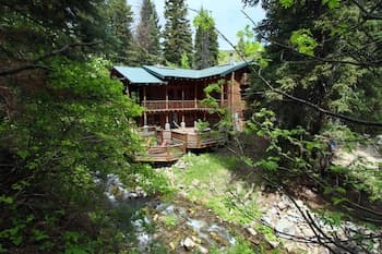 Log Cabin on the Stream