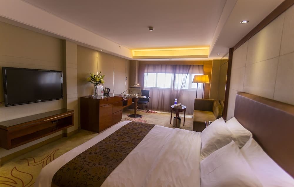 Manhattan Kinlen Hotel - Shishi