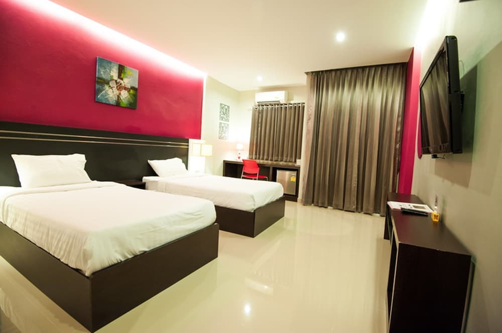 The Cozy Nest Boutique Rooms