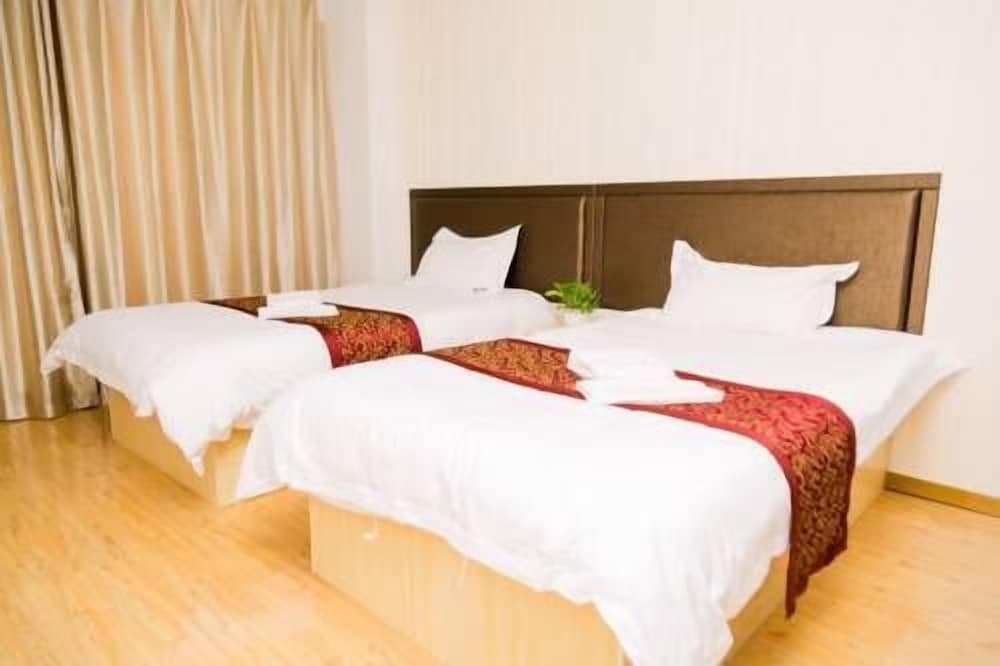 Weihai Dushang Huayi Apartment Hotel