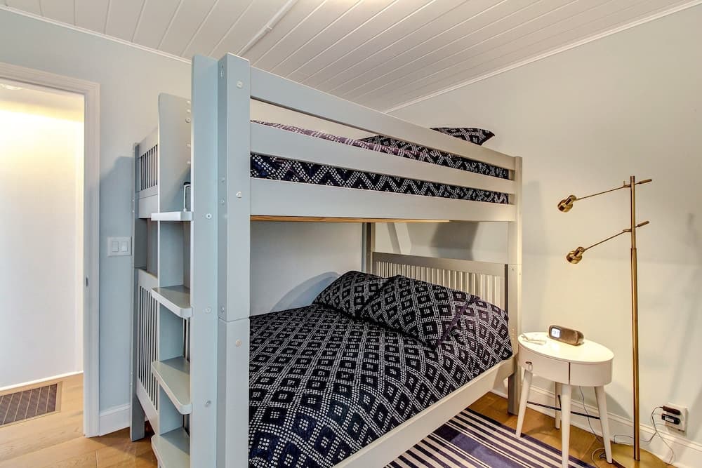 Roomy Chalet-Style Beachfront Condo with Private Beach Access by RedAwning