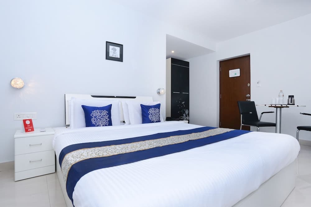 Capital O 10611 Hotel Malabar Illam