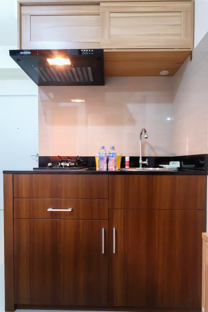 Studio Room at Green Pramuka City Apartment with Mall Access By Travelio