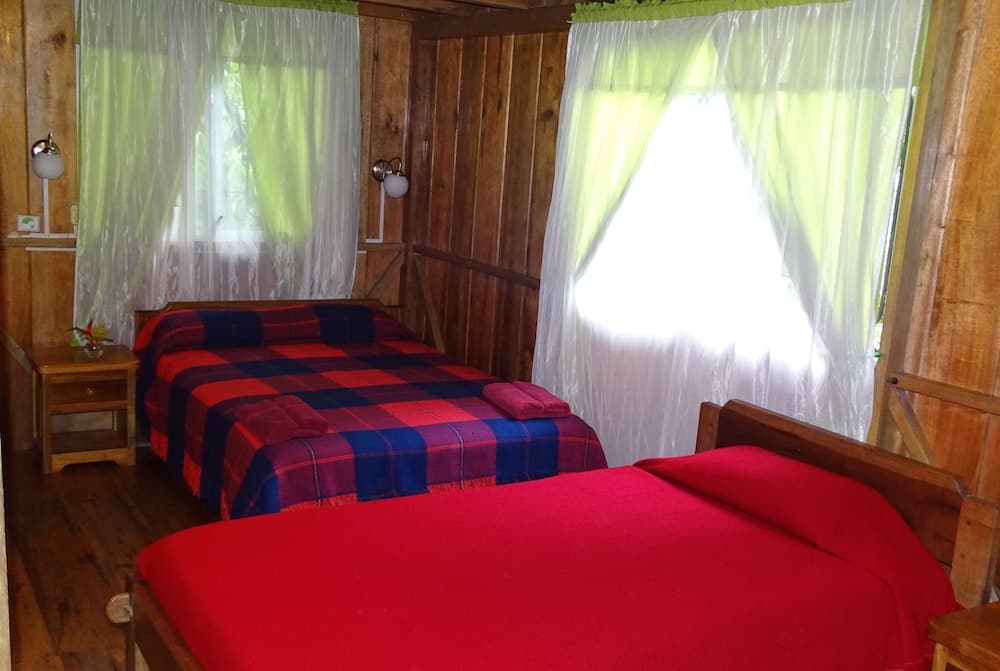 Cabañas Armonía y Jardín de Orquideas