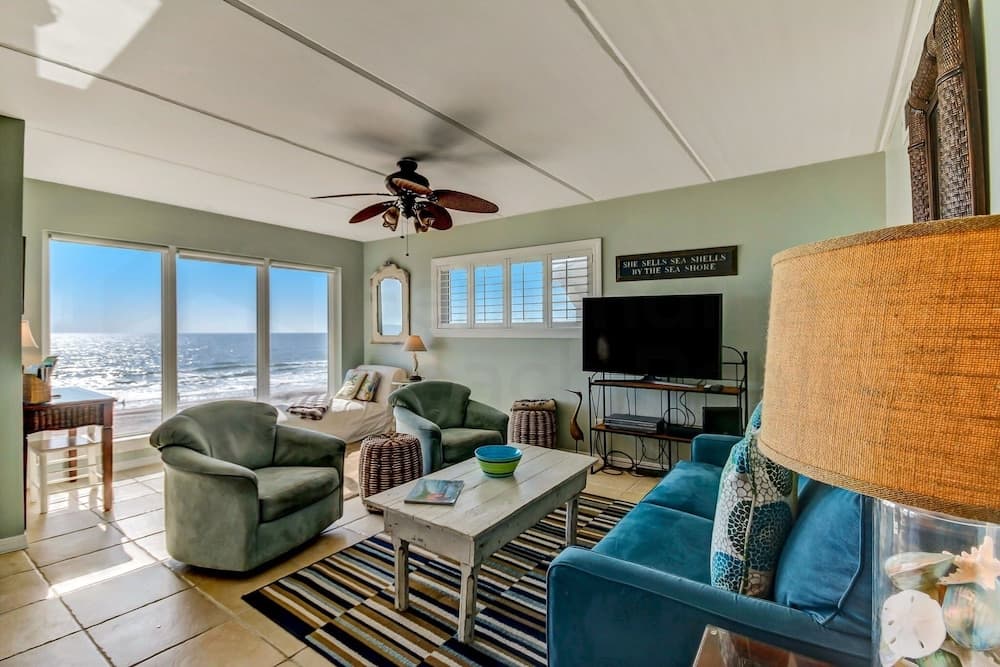 End Unit Oceanside Condo with Spectacular Ocean View from Living Area by RedAwning