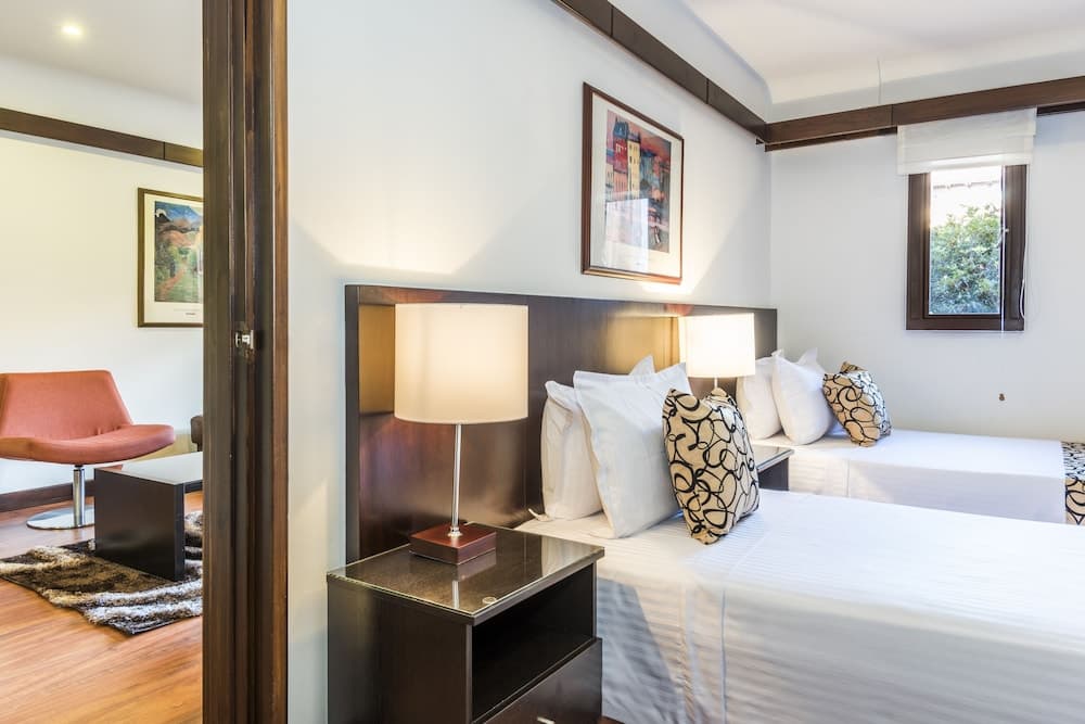 Travelers Suites Condominio Plenitud