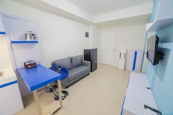 Cozy Apartment at Parahyangan Residence with Direct Access to Swimming Pool