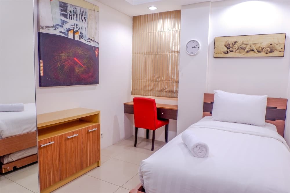 Cozy Pool View Kemang Village Residence Apartment with Direct Access to Mall