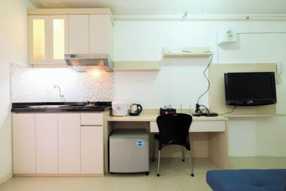 1BR with Sofa Bed at Bassura City Apartment