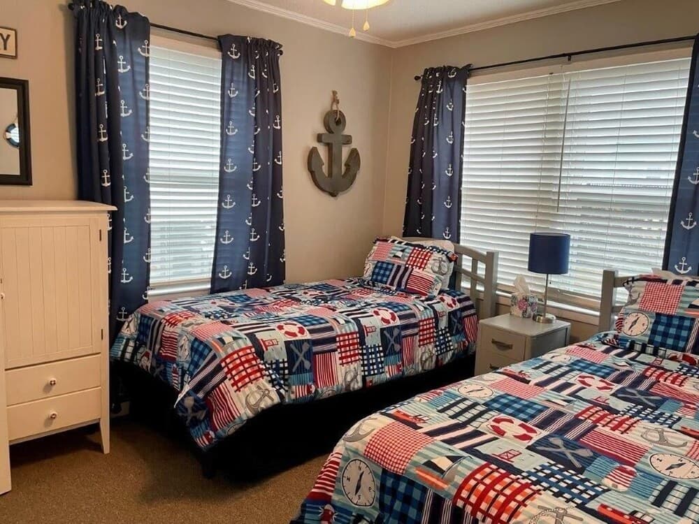 Sandy Bottoms 4 Bedroom Home by RedAwning