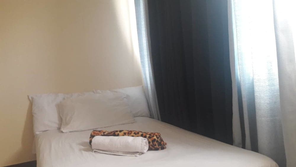 Ekonumi Rooms at Benrosi Plaza