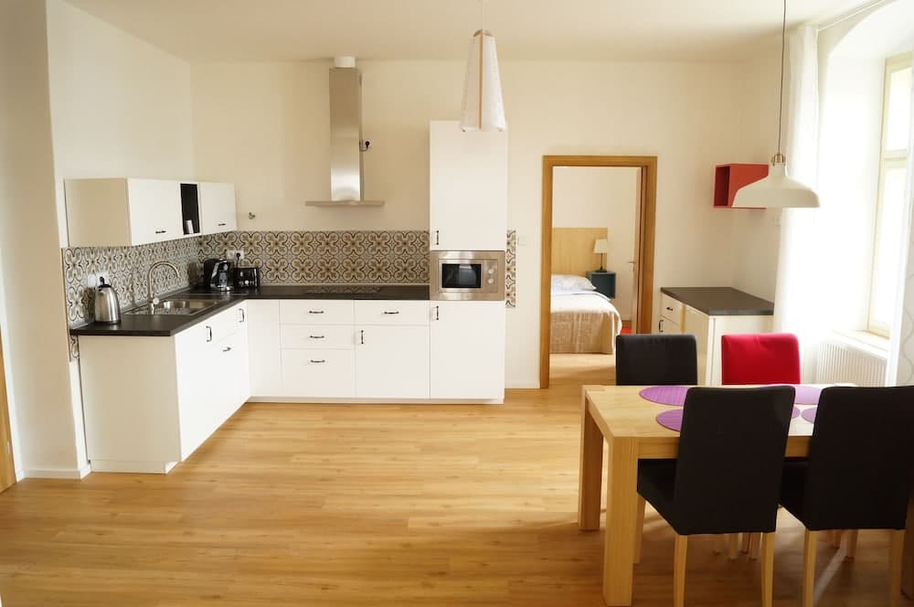 Apartmány u komína