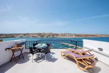 Harbour Lights Seafront Penthouse by Getaways Malta