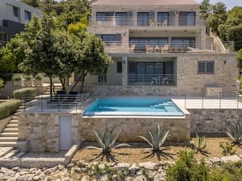 Beachfront Villa Poseidon with Heated Pool