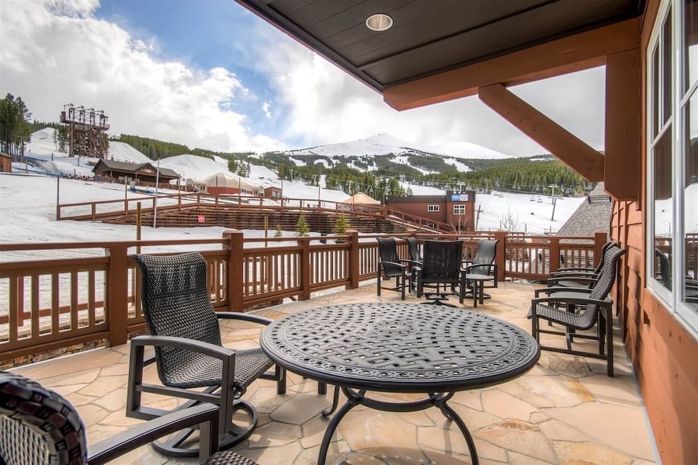 Expansive 4 Bedroom Ski in, Ski out One Ski Hill Residence Located at the Base of Peak 8 with Beautiful Views