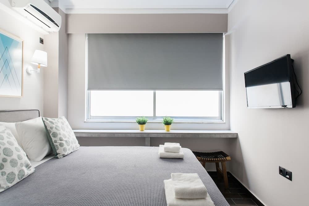 Athenian Downtown Studios by Livin Urbban