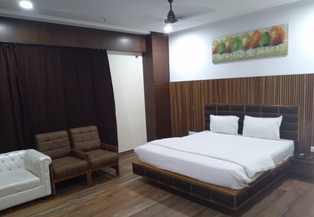 ADB Rooms Hotel Surabhi International