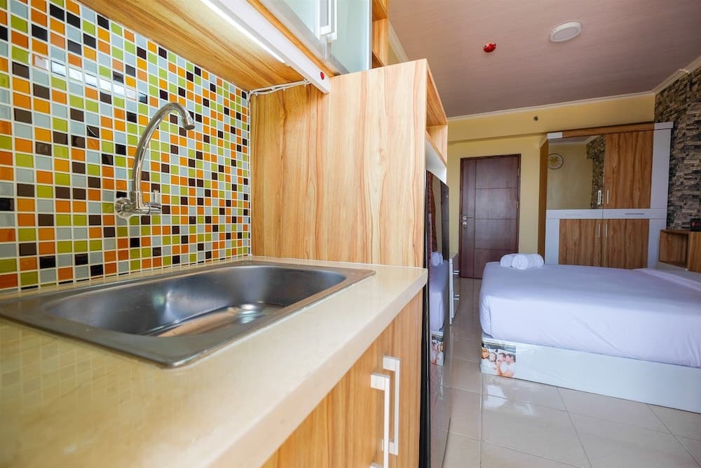 Minimalist and Comfy Studio at Pluit Sea View Apartment