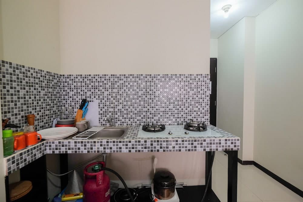 Garden View Studio at Nifarro Park Apartment