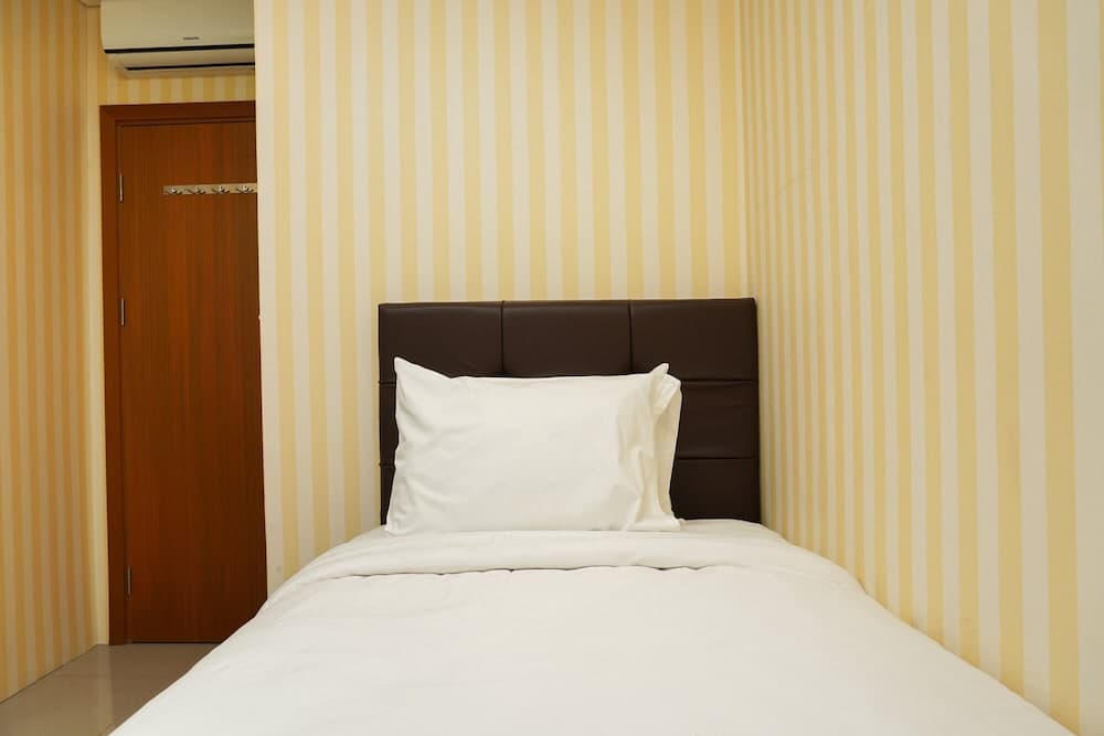 2BR Apartment with Sofa Bed at Woodland Park Residence