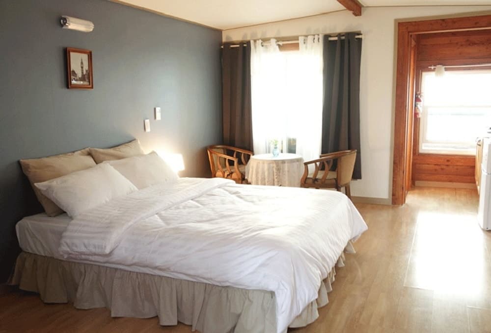 Windmill and Sea Pension