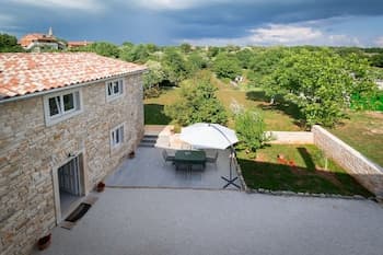 Stone house Furlani with a lovely garden