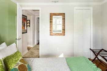 Vibrant, Colorful Condo Building With Backyard Firepit and Games