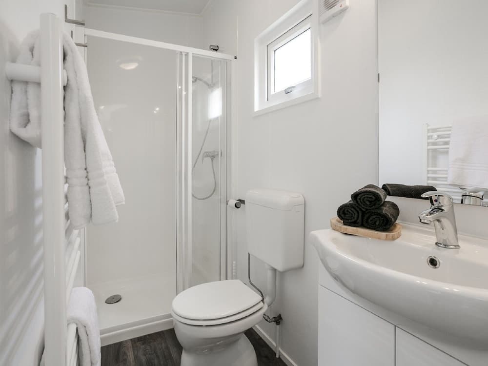 Sunlit Chalet by the Pond