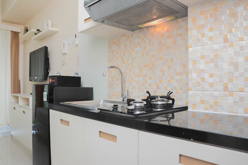 Clean Studio Apartment at Grand Dhika City