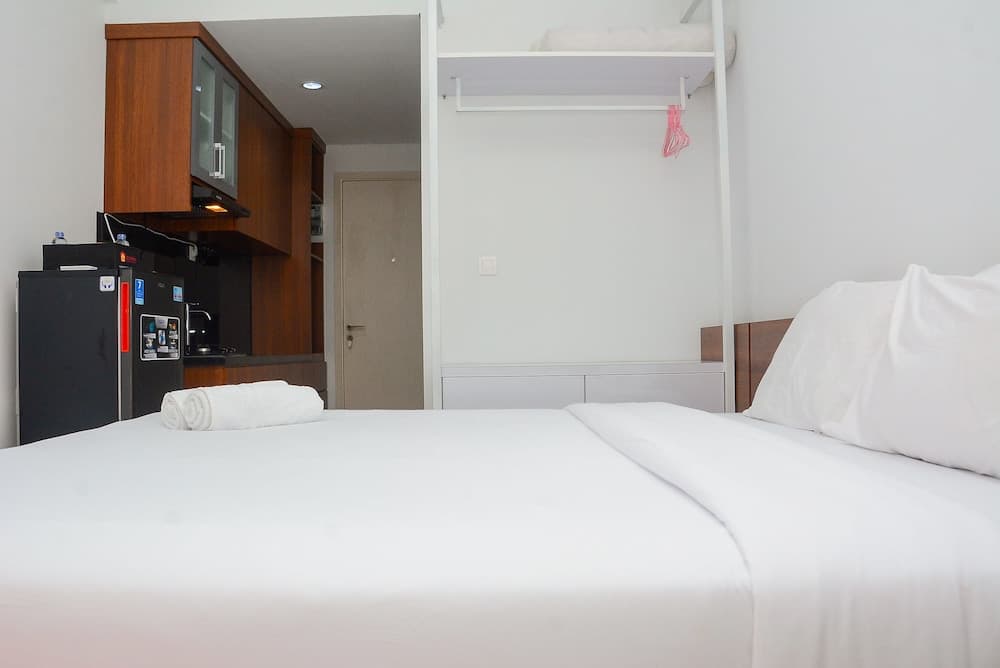 Comfy Studio Room at Patraland Urbano Apartment