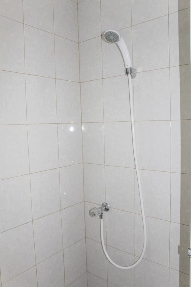 Minimalist Studio Apartment at Poris 88 with City View