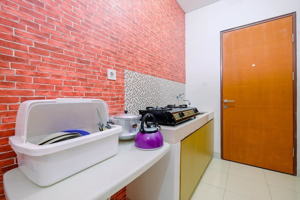 Cozy and Minimalist Studio at Dave Apartment