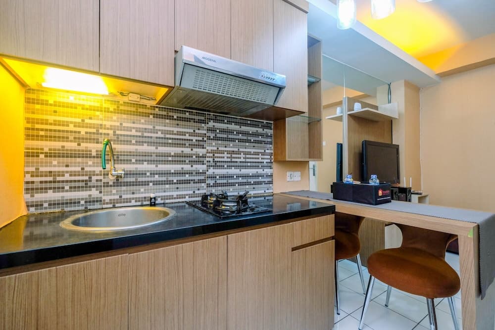 Strategic and Homey 1BR Kalibata City Apartment