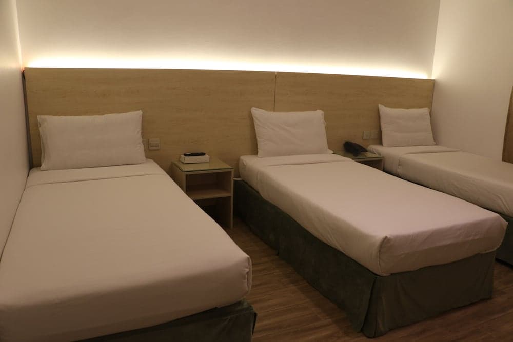 Al Alya Hotel Rooms and Suites