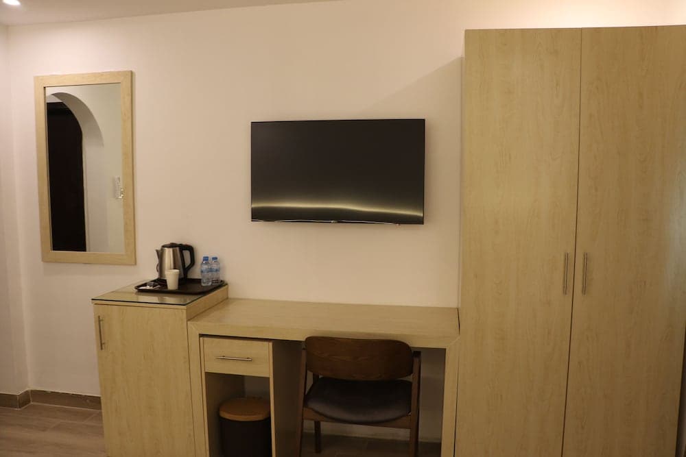 Al Alya Hotel Rooms and Suites