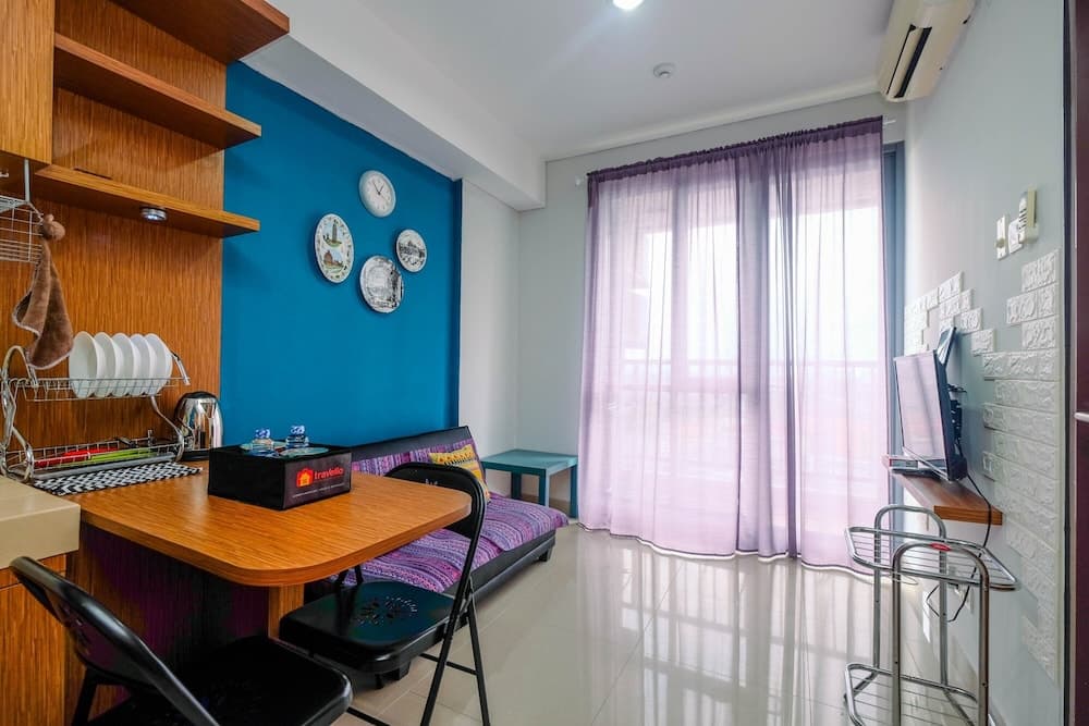 Homey and Comfortable 1BR Apartment at Royal Olive Residence
