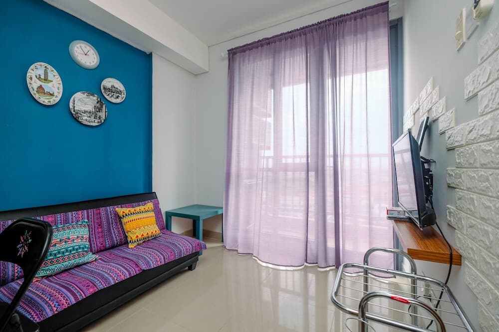 Homey and Comfortable 1BR Apartment at Royal Olive Residence