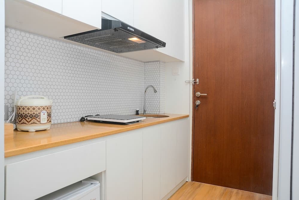 Best Studio Room with Wall Bed Tifolia Apartment