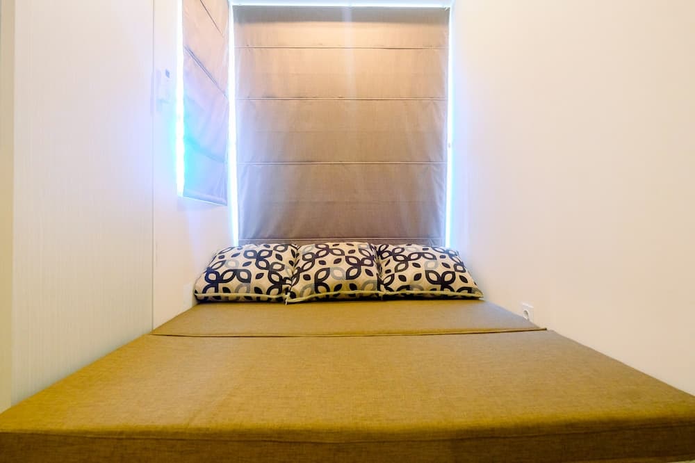 Unique Studio Room with Multifunction Bed @ Grand Kamala Lagoon Apartment
