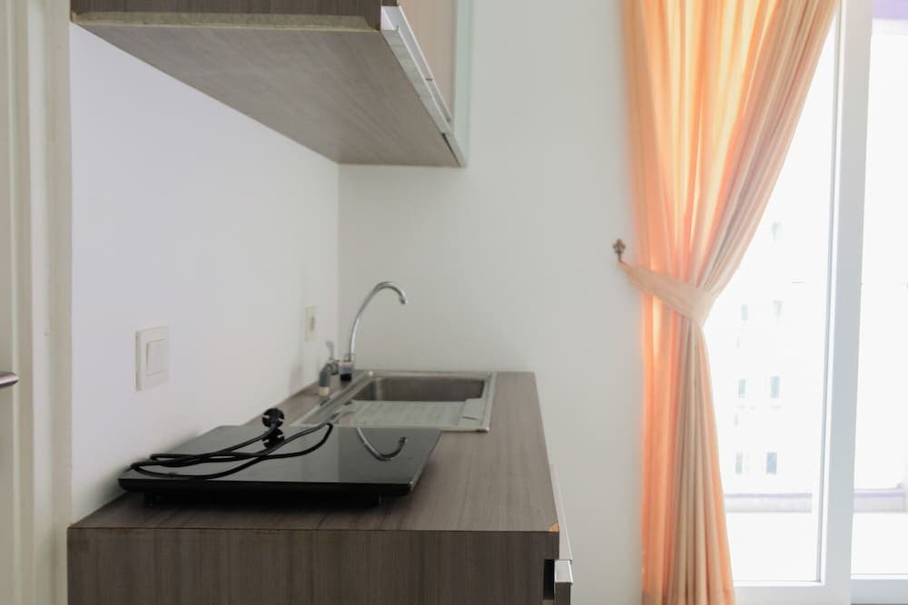 Comfy 2BR (No Kitchen) Apartment at Aeropolis Crystal Residence