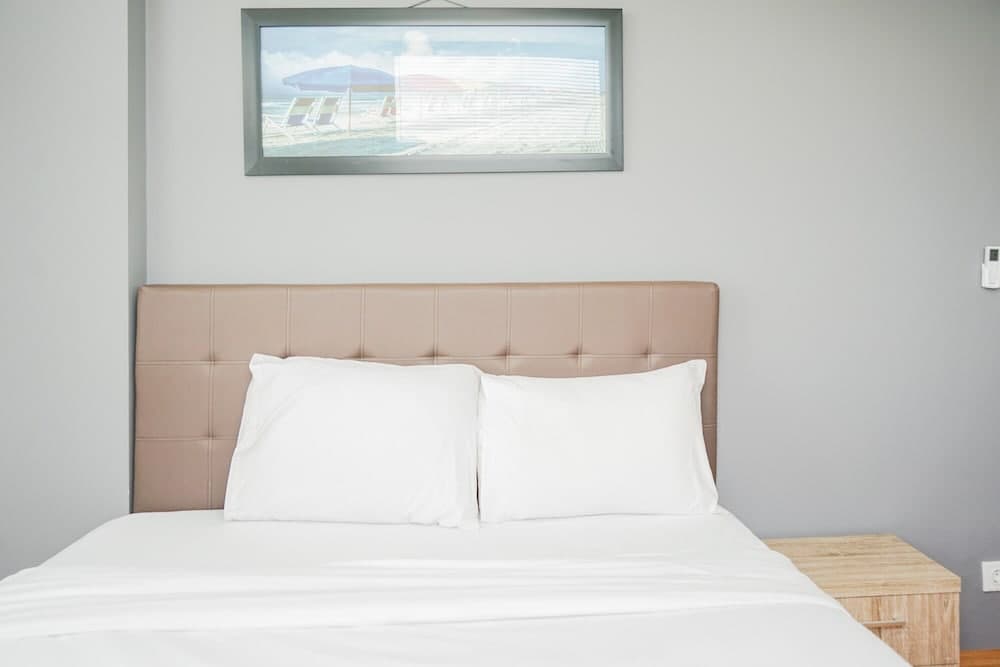 Cozy 2BR Apartment at Tuscany Residences With Garden View