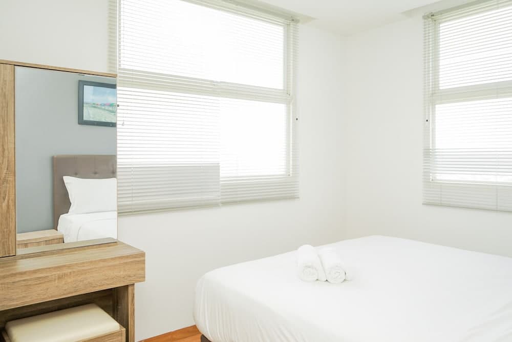 Cozy 2BR Apartment at Tuscany Residences With Garden View